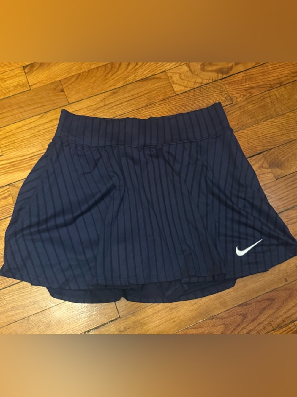 Nike Navy Pinstripe Tennis Skort with White Swoosh Accent